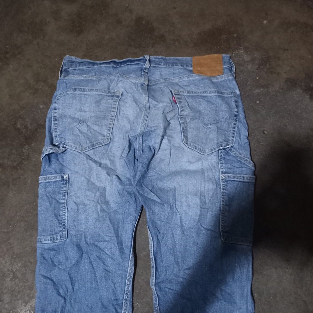 Levi's premium 502 carpenter pants (Category: Jeans) located in Manila. Submitted by tcbukay_zxc25 (Listing ID 1463447663, Image 2). Description: Levi's premium 502 carpenter pants waistline 34-35 length 41 leg opening 7 excellent no issue.
