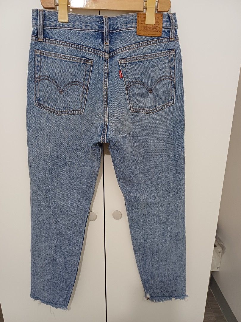 Levi's Wedgie Jeans (Category: Jeans) located in Bacoor. Submitted by ckarhizma (Listing ID 1463401045, Image 2). Description: - Size 27 tag - High-waisted, straight leg fit - Button fly closure - Frayed hem detail - Made with Water<Less technology .