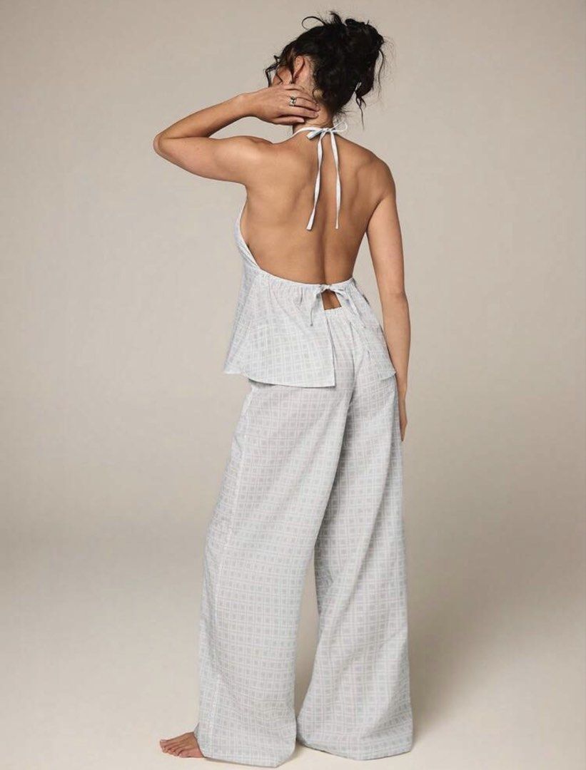 Light Blue Plaid Halter Neck Coords (Category: Sets or Coordinates) located in Villasis. Submitted by juliaxgamboa (Listing ID 1463525983, Image 3). Description: - Small to med - Halter neck camisole top with tie back - Wide leg pants with matching plaid pattern - Light and breathable fabric - Cute and relaxed look.
