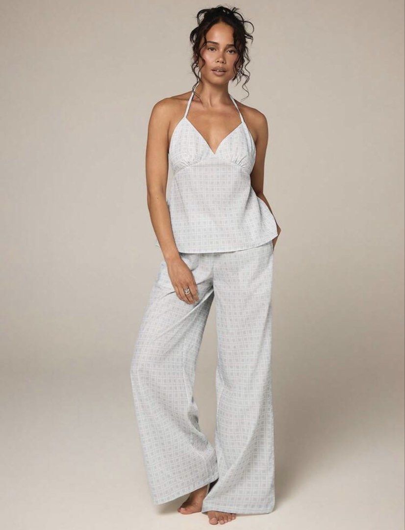 Light Blue Plaid Halter Neck Coords (Category: Sets or Coordinates) located in Villasis. Submitted by juliaxgamboa (Listing ID 1463525983, Image 1). Description: - Small to med - Halter neck camisole top with tie back - Wide leg pants with matching plaid pattern - Light and breathable fabric - Cute and relaxed look.