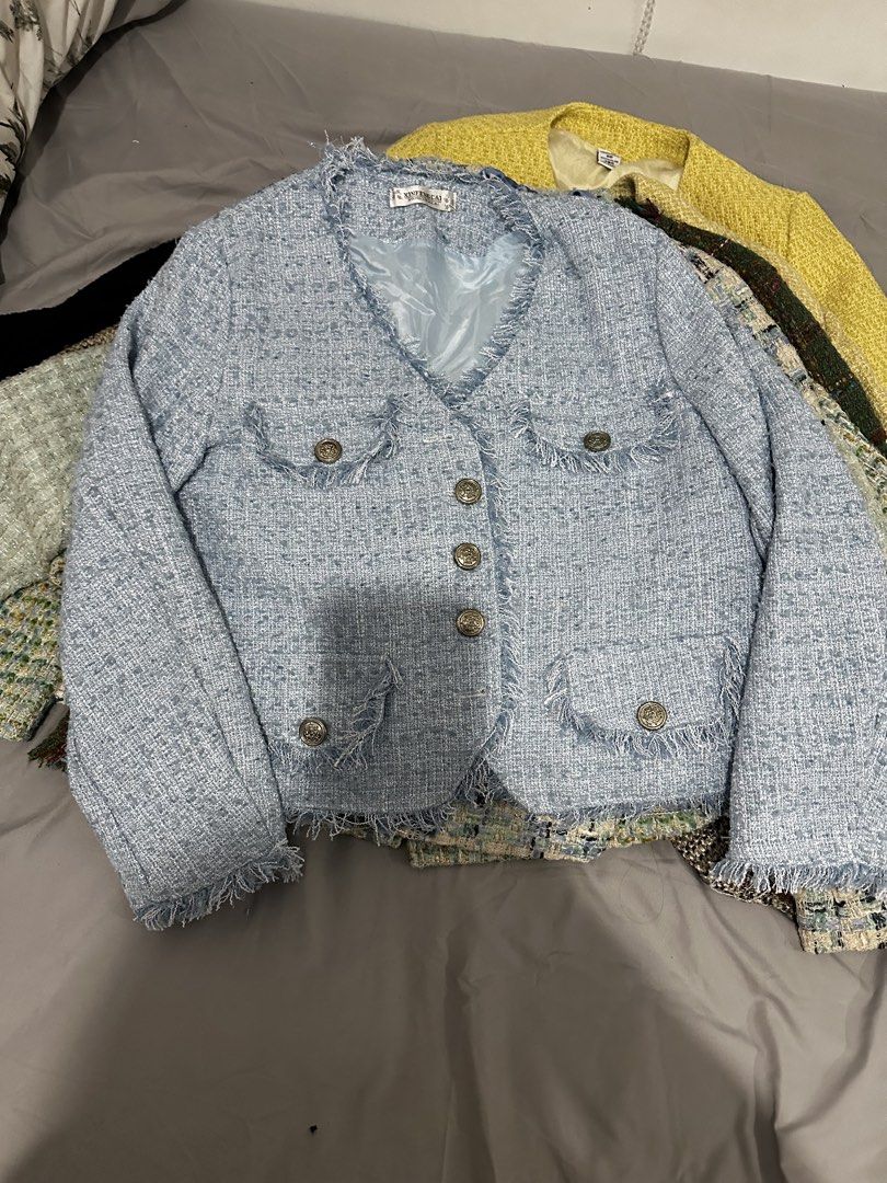 Light Blue Tweed Jacket with Buttons (Category: Coats, Jackets and Outerwear) located in Manila. Submitted by everythingsale101 (Listing ID 1463477548, Image 3). Description: - Light blue cropped tweed jacket - Features frayed edges - Fully lined interior - Versatile: pairs well with jeans or skirts - Ideal for spring or fall outfits - Creates a chic, put-together look Fits M-L (up to 38 bust) Issue: button details see pics (issue: lightly tarnis