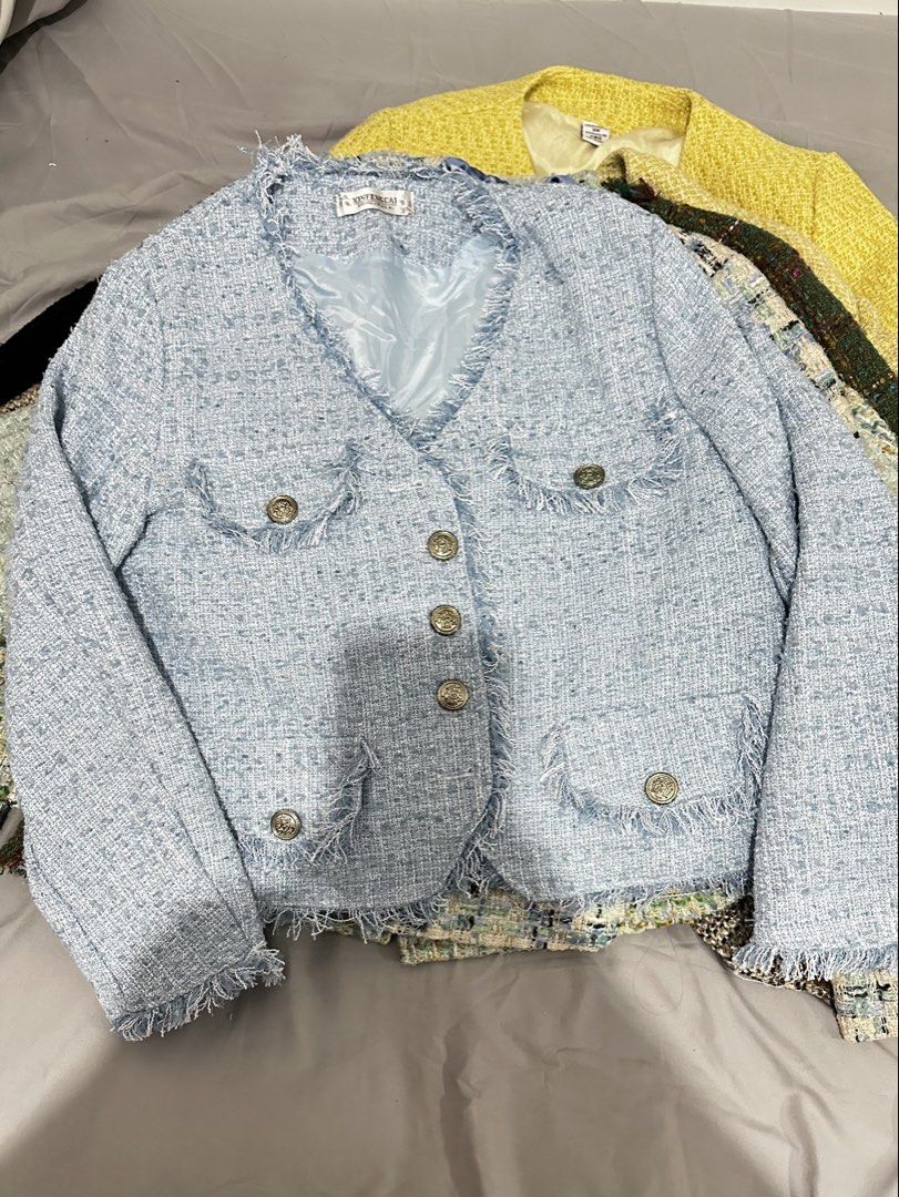 Light Blue Tweed Jacket with Buttons (Category: Coats, Jackets and Outerwear) located in Manila. Submitted by everythingsale101 (Listing ID 1463477548, Image 1). Description: - Light blue cropped tweed jacket - Features frayed edges - Fully lined interior - Versatile: pairs well with jeans or skirts - Ideal for spring or fall outfits - Creates a chic, put-together look Fits M-L (up to 38 bust) Issue: button details see pics (issue: lightly tarnis