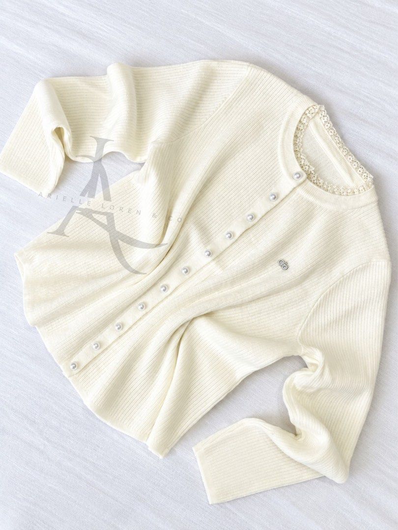 LIGHT CREAM - ROUND NECK KNITTED CARDIGAN (Category: Coats, Jackets and Outerwear) located in Manila. Submitted by ariellelorenco (Listing ID 1463349188, Image 1). Description: 👉🏻Knitted cardigan 👉🏻Stretchable fabric 👉🏻Smooth and soft fabric (non itchy) 👉🏻Can fit up to XL (or more than) 👉🏻Pearl-like buttons (all working buttons) 👉🏻Round neckline with lace details 👉🏻22 in length 👉🏻Bust size up to 40 in max 👉🏻With stitched in meta