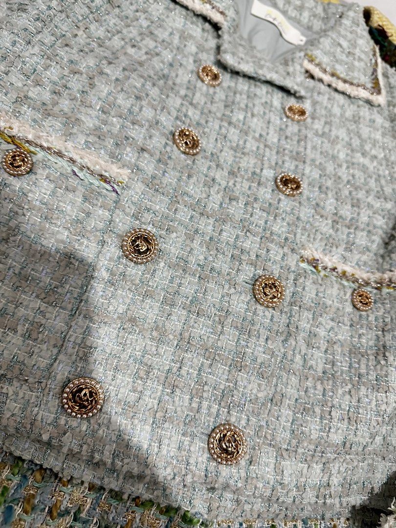 Mint Green Tweed Double-Breasted Cropped Jacket (Category: Coats, Jackets and Outerwear) located in Manila. Submitted by everythingsale101 (Listing ID 1463478748, Image 2). Description: - Mint green tweed fabric - Gold button details - Double-breasted design - Cropped fit - Frayed trim on collar, pockets, and hem - Versatile for dressing up or down Best fit Large up to 40 bust -Premium Tweed Blazers bundle available. 1500 for 3 pcs..