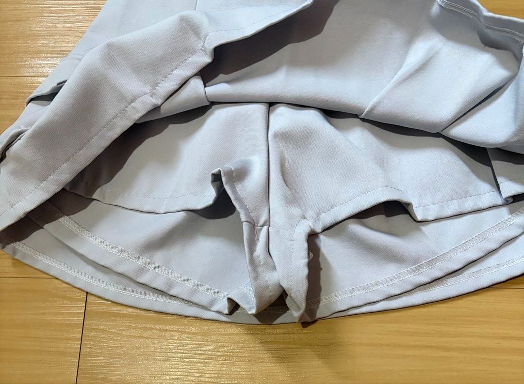 Light Grey Cargo Pleated Skirt Size 25-30 (Category: Skirts) located in Quezon City. Submitted by garagesale2026 (Listing ID 1463336810, Image 3). Description: - Unused, washed - With built-in shorts - Garterized back waist - From Bangkok.