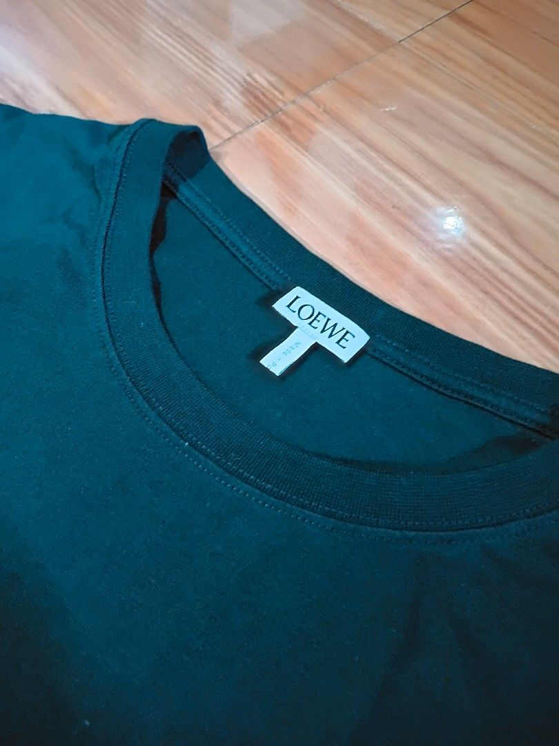 Loewe Anagram Embroidered T-Shirt (Category: Tshirts & Polo Shirts ) located in Bulacan. Submitted by darrensthrift (Listing ID 1463376368, Image 3). Description: NEGOTIABLE❗️❗️ Size L on tag L29 W20 Issue: cut waist tag sa loob the rest wala na 📍SJDM, BULACAN.