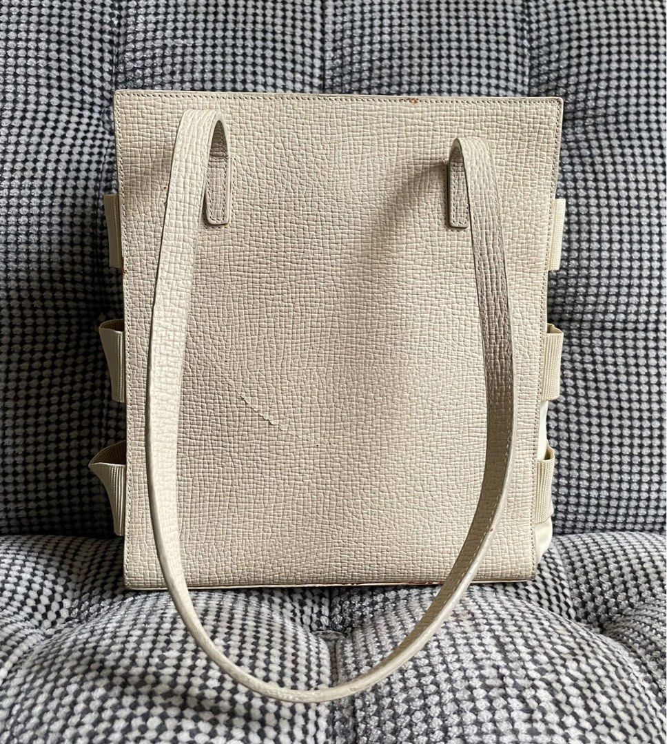 Loewe ivory leather cage style tote bag (Category: Shoulder Bags) located in Bulacan. Submitted by thriftbagcollections (Listing ID 1463442304, Image 2). Description: Loewe ivory leather cage style tote bag,good condition with some signs of usage only.Approx:H-9.5”W-8”D-2.5” handle 11”.