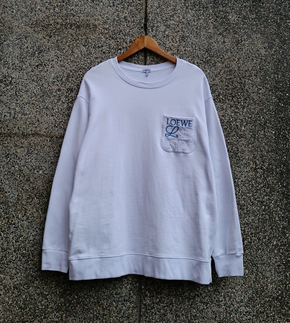 Loewe Pocket Sweatshirt (Category: Activewear) located in Davao. Submitted by st333tcartel (Listing ID 1463383572, Image 1). Description: Large Length 30 Width 23 Issue:Slight pinhole at both armpit.
