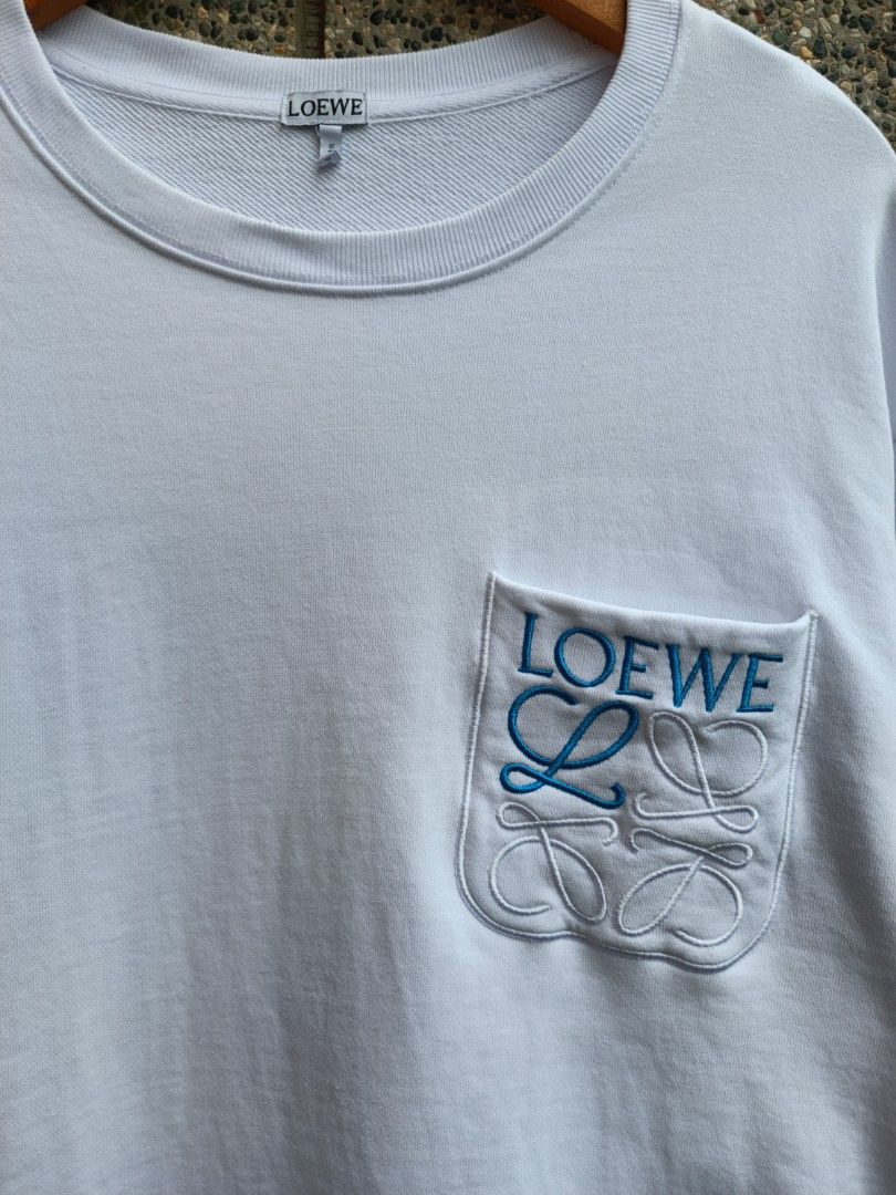 Loewe Pocket Sweatshirt (Category: Activewear) located in Davao. Submitted by st333tcartel (Listing ID 1463383572, Image 2). Description: Large Length 30 Width 23 Issue:Slight pinhole at both armpit.