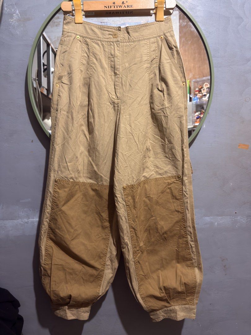 LOEWE SS21 Balloon Trouser Pants (Category: Luxury Apparel) located in Manila. Submitted by tindero-ng-damit (Listing ID 1463344965, Image 2). Description: Name: LOEWE BALLOON TROUSER PANTS Color: Beige 2tone Size: 36 on tag Measurement: Waist: 28 Inseam: 27 Length: 39 Thigh: 14 Issues: None .