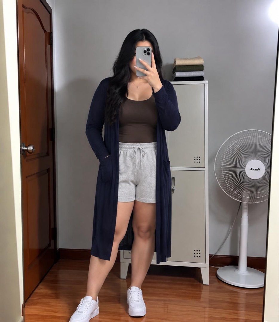 Long Sleeve Cardigan - Navy Blue (Category: Coats, Jackets and Outerwear) located in Manila. Submitted by despacito17 (Listing ID 1463342990, Image 3). Description: - Navy blue long cardigan - Features convenient front pockets - Lightweight and flowy material - Ideal for layering over tops or dresses - Perfect for casual outings or lounging at home - Versatile styling with shorts or jeans.