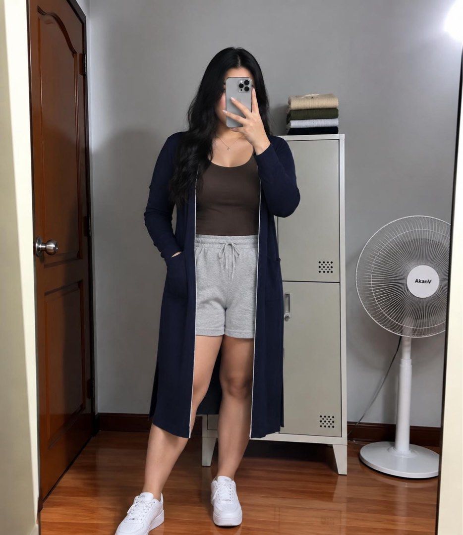 Long Sleeve Cardigan - Navy Blue (Category: Coats, Jackets and Outerwear) located in Manila. Submitted by despacito17 (Listing ID 1463342990, Image 1). Description: - Navy blue long cardigan - Features convenient front pockets - Lightweight and flowy material - Ideal for layering over tops or dresses - Perfect for casual outings or lounging at home - Versatile styling with shorts or jeans.