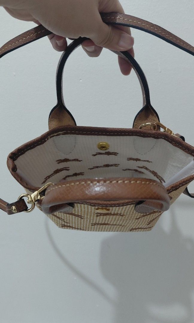 LongChamp (Category: Cross-body Bags) located in Pasig City. Submitted by janalopez904 (Listing ID 1463380060, Image 3). Description: Original Made in france Mini Longchamp Like Cellphone case Made in france.