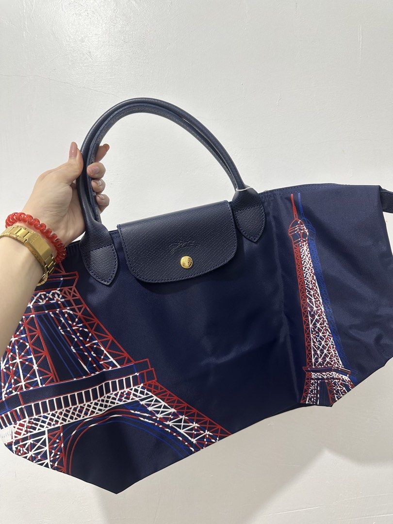 Longchamp Le Pliage Eiffel Tower Navy Blue Tote Bag (Category: Luxury Bags & Wallets) located in Cavite. Submitted by aljennaaaa (Listing ID 1463503362, Image 1). Description: Flawless, no issue at all.