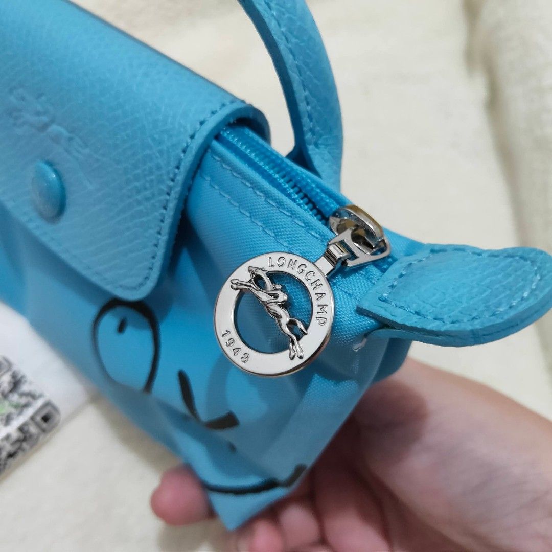 longchamp x andre top handle pouch (Category: Luxury Bags & Wallets) located in Las Pinas. Submitted by glamdustph (Listing ID 1463455552, Image 3). Description: 💯 authentic complete inclusions plus sf thank you.