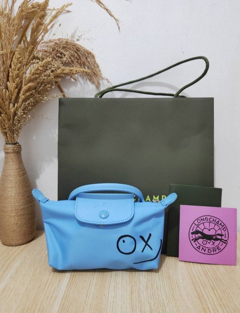 longchamp x andre top handle pouch (Category: Luxury Bags & Wallets) located in Las Pinas. Submitted by glamdustph (Listing ID 1463455552, Image 2). Description: 💯 authentic complete inclusions plus sf thank you.