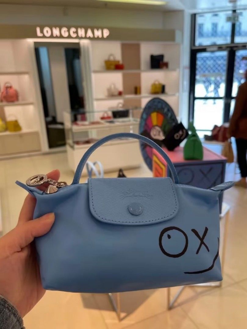 longchamp x andre top handle pouch (Category: Luxury Bags & Wallets) located in Las Pinas. Submitted by glamdustph (Listing ID 1463455552, Image 1). Description: 💯 authentic complete inclusions plus sf thank you.
