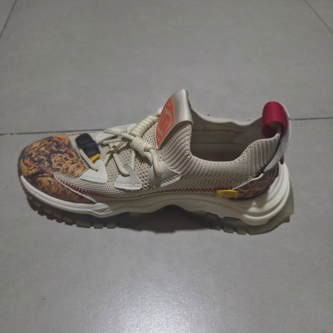 Fincotton shoes (Category: Sneakers) located in Pasig City. Submitted by zenstorm_e20535 (Listing ID 1463397423, Image 2). Description: - Unique beige knit upper - Eye-catching brown and orange patterned overlays - Red pull tabs on the heel for easy wear - Chunky, stylish white sole - Ideal for everyday casual outfits.