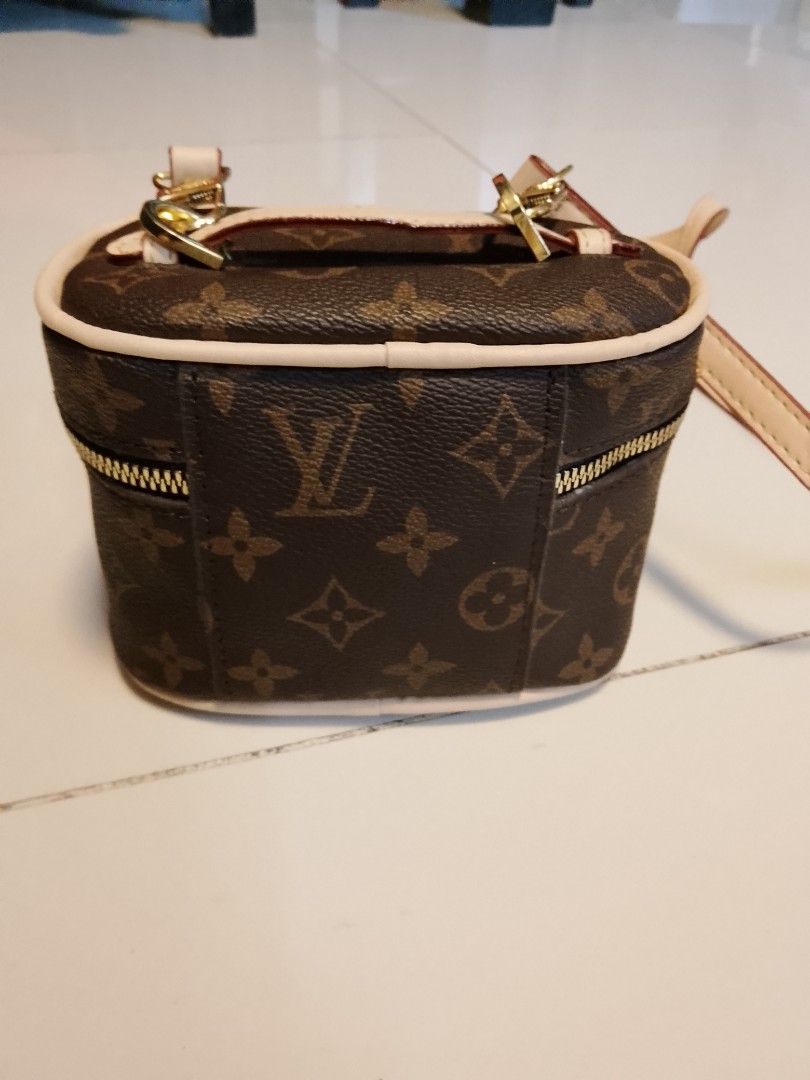 Louis Vuitton mini sling (Category: Cross-body Bags) located in Manila. Submitted by wildwind_73f77a (Listing ID 1463386444, Image 2). Description: excellent condition no issue.