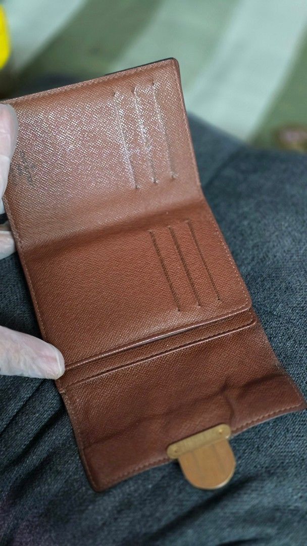 Louis Vuitton Monogram Canvas Bifold Koala Wallet (Category: Luxury Bags & Wallets) located in Quezon City. Submitted by anitsircamsiugal (Listing ID 1463357771, Image 3). Description: - Authentic Louis Vuitton Monogram Wallet - Classic Monogram Canvas - Secure Snap Closure - Convenient Zip Coin Pocket - Multiple Card Slots - Clear ID Window - Minor signs of wear on canvas and hardware (adds character!) - Interior lining is clean and well-maintai