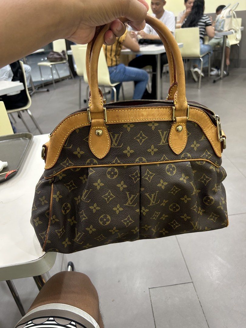 Louis Vuitton Monogram Canvas Speedy Bag (Category: Luxury Bags & Wallets) located in Quezon City. Submitted by thriftxgoods (Listing ID 1463375017, Image 2). Description: - Authentic Louis Vuitton Speedy Bag - Classic Monogram Canvas - Tan Leather Trim and Handles - Red Interior with Strap - Made in France - Secure Zipper Closure - Iconic Louis Vuitton Piece.