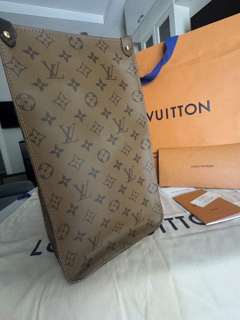 Louis Vuitton Monogram Giant Onthego Tote Bag (Category: Luxury Bags & Wallets) located in Malolos. Submitted by luxeandlately (Listing ID 1463341019, Image 3). Description: Good as brandnew Otg GM size No defects With dustbag, cards, LV receipt and paper bag Bought in LV Italia Free bag organizer - Authentic Louis Vuitton Onthego Tote Bag - Features the iconic Giant Monogram print - Spacious interior, ideal for daily essentials or travel - Comes