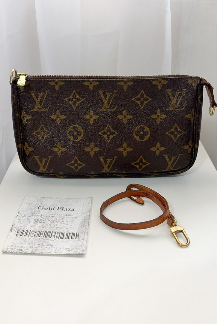 Louis Vuitton Monogram Pochette (Category: Luxury Bags & Wallets) located in Manila. Submitted by ceethingsout (Listing ID 1463334057, Image 1). Description: Selling my pre-loved Louis Vuitton Monogram Pochette 🤎 * Classic LV Monogram canvas * Gold-tone zipper and hardware * Original strap included, but the strap has broken/dislodged from the pouch and has been removed (The broken/dislodged strap is included with the sale) * has signs of normal 