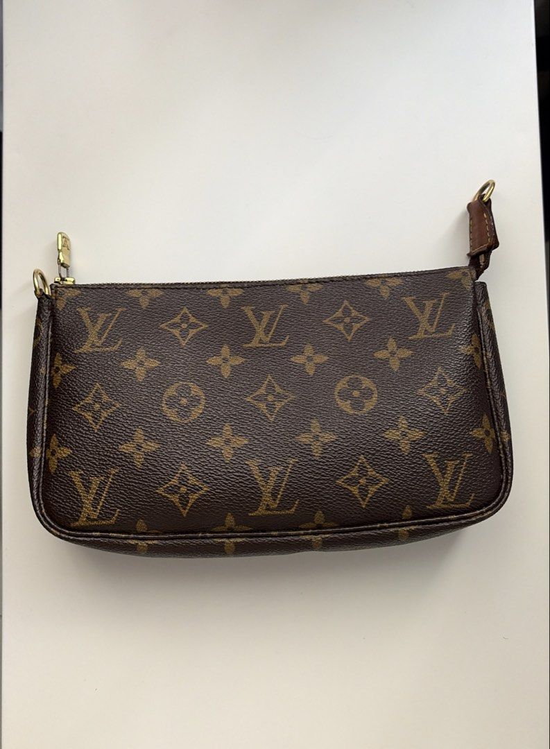 Louis Vuitton Monogram Pochette (Category: Luxury Bags & Wallets) located in Manila. Submitted by ceethingsout (Listing ID 1463334057, Image 2). Description: Selling my pre-loved Louis Vuitton Monogram Pochette 🤎 * Classic LV Monogram canvas * Gold-tone zipper and hardware * Original strap included, but the strap has broken/dislodged from the pouch and has been removed (The broken/dislodged strap is included with the sale) * has signs of normal 