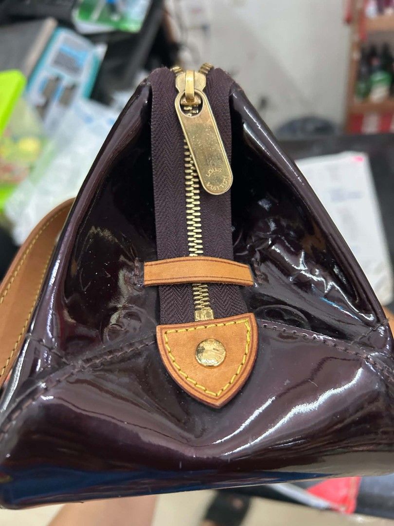 Louis Vuitton Monogram Vernis Alma PM Bag (Category: Luxury Bags & Wallets) located in Manila. Submitted by silentbear-c433 (Listing ID 1463475426, Image 2). Description: - Authentic Louis Vuitton Alma Bag - Color: Deep Purple Patent Leather - Features embossed Monogram pattern - Tan leather handles and trim - Secure zipper closure - Interior pocket - Made in France - Ideal for everyday use.