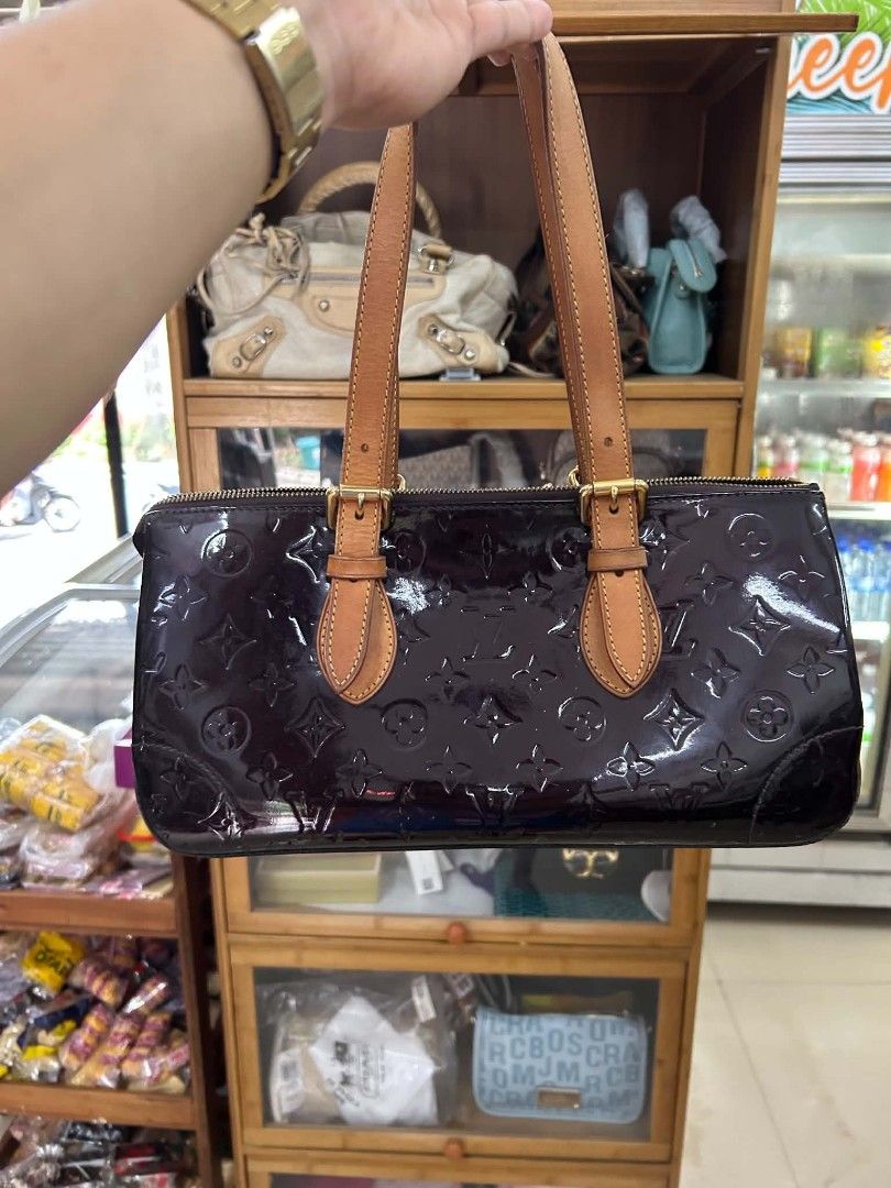 Louis Vuitton Monogram Vernis Alma PM Bag (Category: Luxury Bags & Wallets) located in Manila. Submitted by silentbear-c433 (Listing ID 1463475426, Image 1). Description: - Authentic Louis Vuitton Alma Bag - Color: Deep Purple Patent Leather - Features embossed Monogram pattern - Tan leather handles and trim - Secure zipper closure - Interior pocket - Made in France - Ideal for everyday use.
