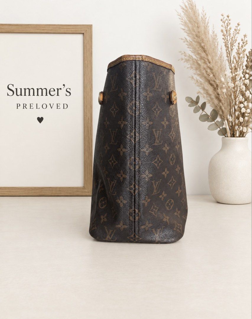 Louis Vuitton Neverfull (Category: Tote Bags) located in Taguig. Submitted by summers.preloved (Listing ID 1463513043, Image 2). Description: Bag Details 🤎 Exterior: Brown Monogram coated canvas with Elvira initials and floral motifs 🍯 Trim and handles: Tan leather with visible darkening and an aged patina 🧵 Design: Open-top tote with a broad rectangular base and a flexible body 👜 Carry style: Two slim handles for shoulder or forearm carry 🔒