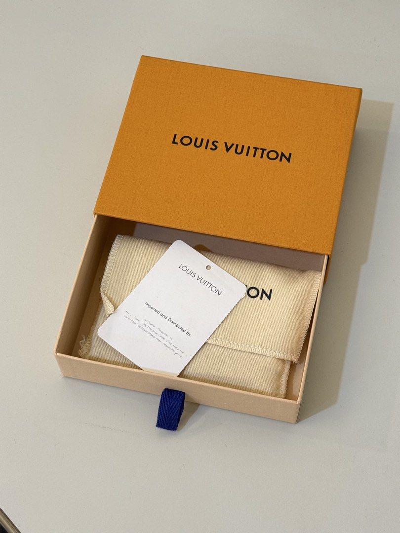 Louis Vuitton Wallet Orange (Category: Luxury Bags & Wallets) located in Manila. Submitted by silent_dosss (Listing ID 1463376370, Image 2). Description: - Authentic Orange Louis Vuitton Wallet - Features Monogram Empreinte pattern - Made in Spain - Interior card slots and pockets - Comes with original Louis Vuitton box, dust bag, and authenticity card - Ideal for organizing cards and cash.
