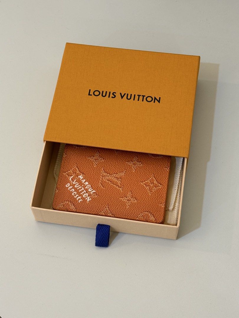 Louis Vuitton Wallet Orange (Category: Luxury Bags & Wallets) located in Manila. Submitted by silent_dosss (Listing ID 1463376370, Image 1). Description: - Authentic Orange Louis Vuitton Wallet - Features Monogram Empreinte pattern - Made in Spain - Interior card slots and pockets - Comes with original Louis Vuitton box, dust bag, and authenticity card - Ideal for organizing cards and cash.