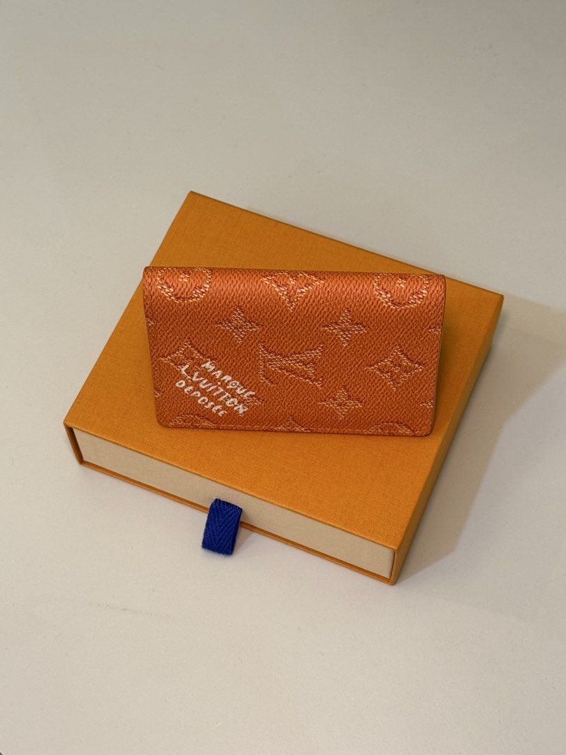 Louis Vuitton Wallet Orange (Category: Luxury Bags & Wallets) located in Manila. Submitted by silent_dosss (Listing ID 1463376370, Image 3). Description: - Authentic Orange Louis Vuitton Wallet - Features Monogram Empreinte pattern - Made in Spain - Interior card slots and pockets - Comes with original Louis Vuitton box, dust bag, and authenticity card - Ideal for organizing cards and cash.