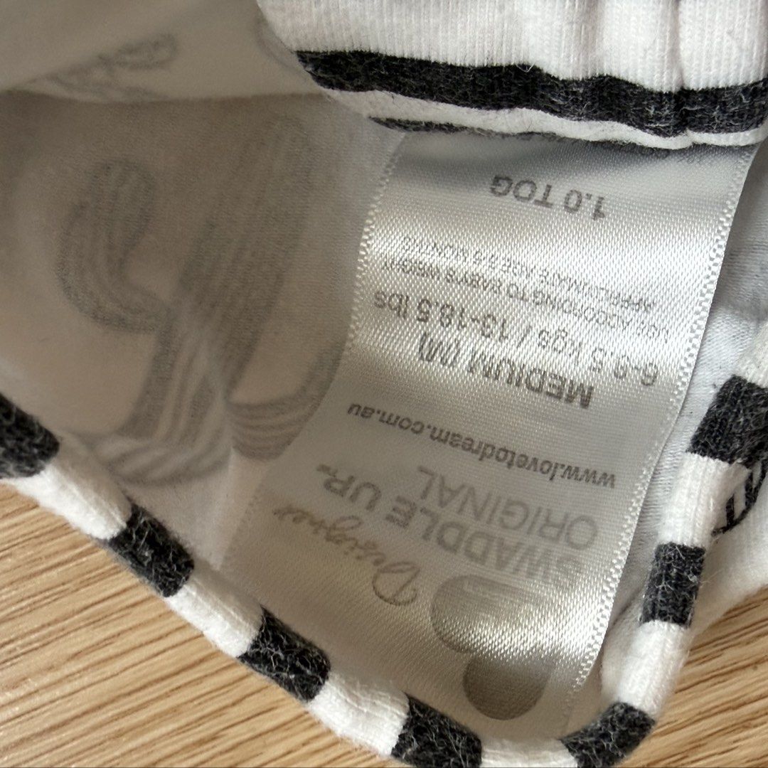 Love To Dream Swaddle Up Original (Medium)q (Category: Babies & Kids Fashion) located in Calamba. Submitted by letsygread9 (Listing ID 1463494722, Image 2). Description: - Love To Dream Swaddle Up Original - 1.0 TOG warmth rating - Size: Medium (fits 6-9.5 kgs) - Adorable cactus and little astronaut print with black & white striped trim - Easy zipper closure - Designed to help your baby sleep soundly.