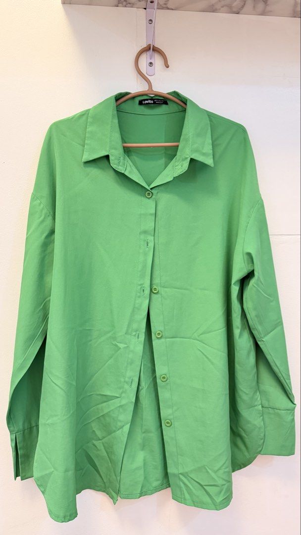 Lovito Green Oversized Button-Up Shirt (Category: Shirts) located in Angeles City. Submitted by hooni_park (Listing ID 1463481066, Image 1). Description: - Lovito green button-up shirt - Oversized fit, long sleeves - Estimated size: Medium - Ideal for casual outfits or layering - Classic and versatile design.