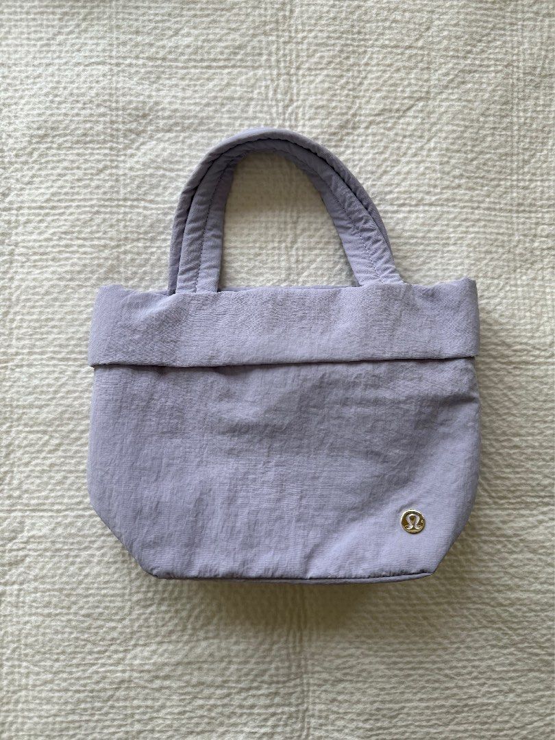 Lululemon On My Level Bag (Lilac, 5L) (Category: Tote Bags) located in Quezon City. Submitted by innarraymundo (Listing ID 1463382701, Image 1). Description: Lululemon On My Level - small - lilac - 5L Bought in HK and only used once! RFS: decluttering.
