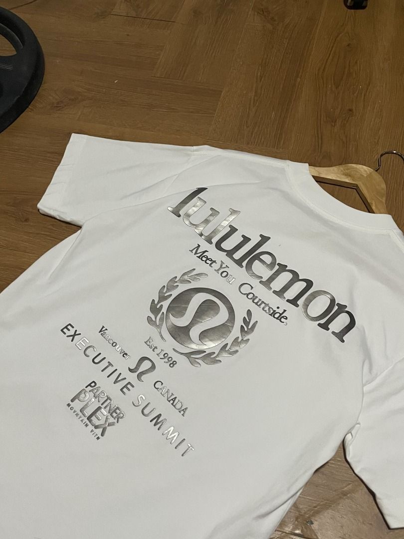 Lululemon T-shirt White with Logo (Category: Tshirts & Polo Shirts ) located in Caloocan City. Submitted by cosmicwhale_40fd28 (Listing ID 1463459939, Image 3). Description: - Classic white Lululemon t-shirt - Features iconic laurel wreath logo on chest - Simple and clean design - Versatile for casual outings or workouts.