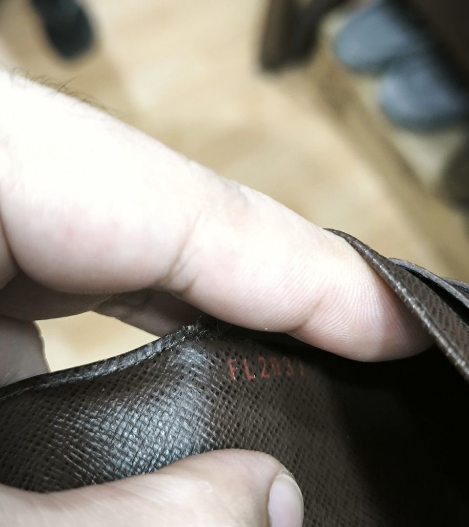LV (Louis Vuitton) Damier Ebene tri-fold wallet (Category: Luxury Bags & Wallets) located in Manila. Submitted by wearforce (Listing ID 1463354764, Image 3). Description: LV (Louis Vuitton) Damier Ebene long trifold wallet (authentic) with multiple card slots and bill compartment snap button closure coded with original box and dust bag no crack, no bakbak fresh in and out 21,000 + SF (open for lalamove or meet up) rfs: Di nagagamit guaranteed aut