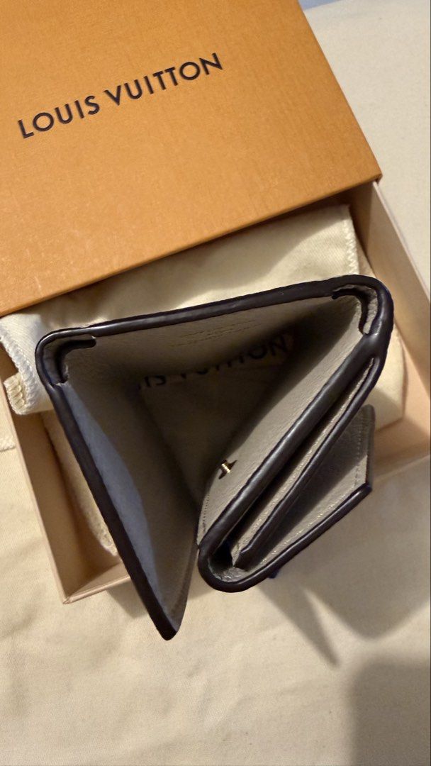 Lv mini wallet calfskin (Category: Luxury Bags & Wallets) located in Angeles City. Submitted by luxuresbagsandaccessories (Listing ID 1463326685, Image 3). Description: Excellent condition No flaws Clean inside and out With box, dustbag and print receipt Bought in Japan Microchip.