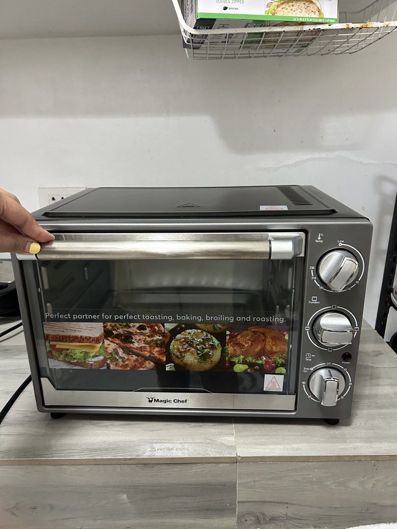 Magic Chef Oven Toaster - Perfect for Toasting, Baking, Broiling, Roasting (Category: Ovens & Toasters) located in Manila. Submitted by cheskalouise07 (Listing ID 1463427777, Image 3). Description: - Magic Chef oven toaster - Versatile: toast, bake, broil, roast - Includes baking tray and wire rack - Easy temperature and function controls - Downward-opening door - Compact, countertop-friendly design.