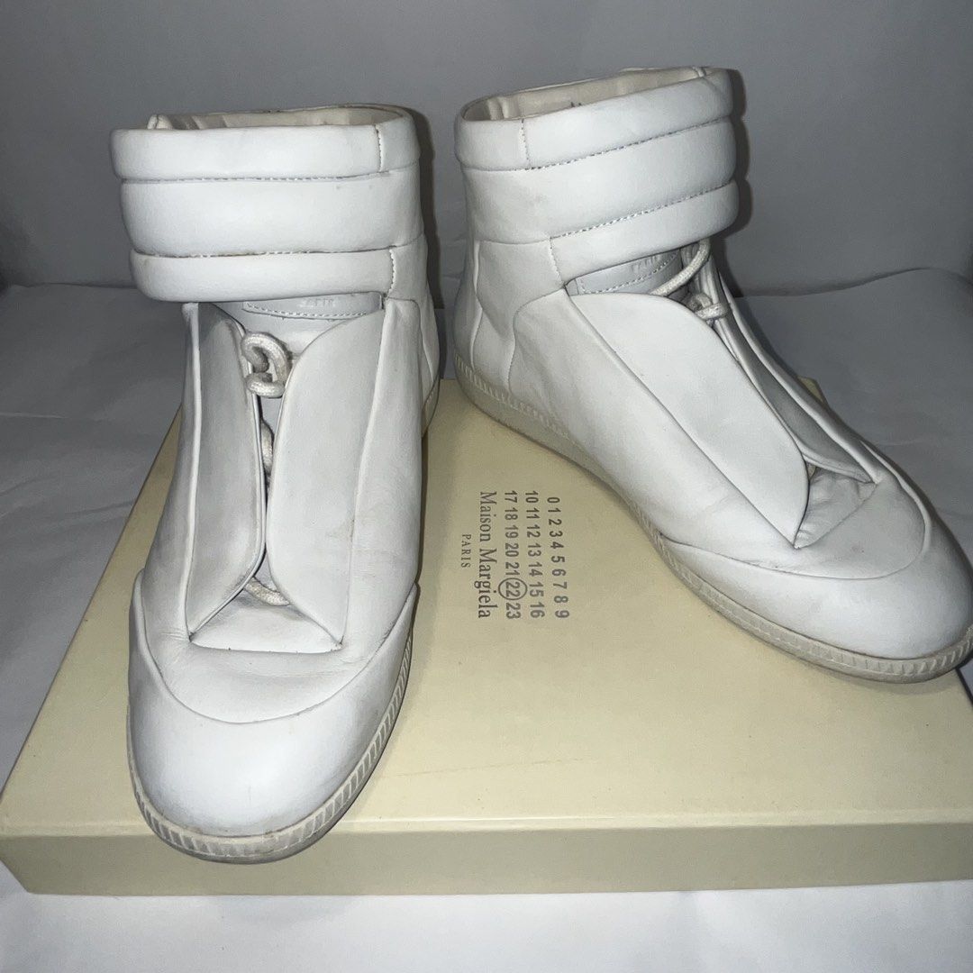 (offers open) Maison Margiela - Future Sneakers Size 40 (Category: Dress Shoes) located in Taguig. Submitted by buytrysellrepeat (Listing ID 1463382252, Image 1). Description: - Maison Margiela Replica High-Top Sneakers - Color: White - Size: 40 - Material: Leather - Origin: Made in Italy - Includes: Original box - Style: Iconic, fashion-forward statement piece.