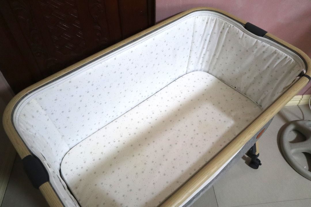 Mambo Co-Sleeper Crib (Category: Cots & Cribs) located in Malolos. Submitted by oneflightdown (Listing ID 1463412630, Image 3). Description: Mambo Co-Sleeper Crib The Mambo Co-Sleeper Crib with Rocker is designed to provide comfort and convenience for both baby and parents. This versatile crib can be converted into a bedside sleeper by unlatching the sidebar, making nighttime feedings easier for breastfeeding moms. It also functions as a gentle b