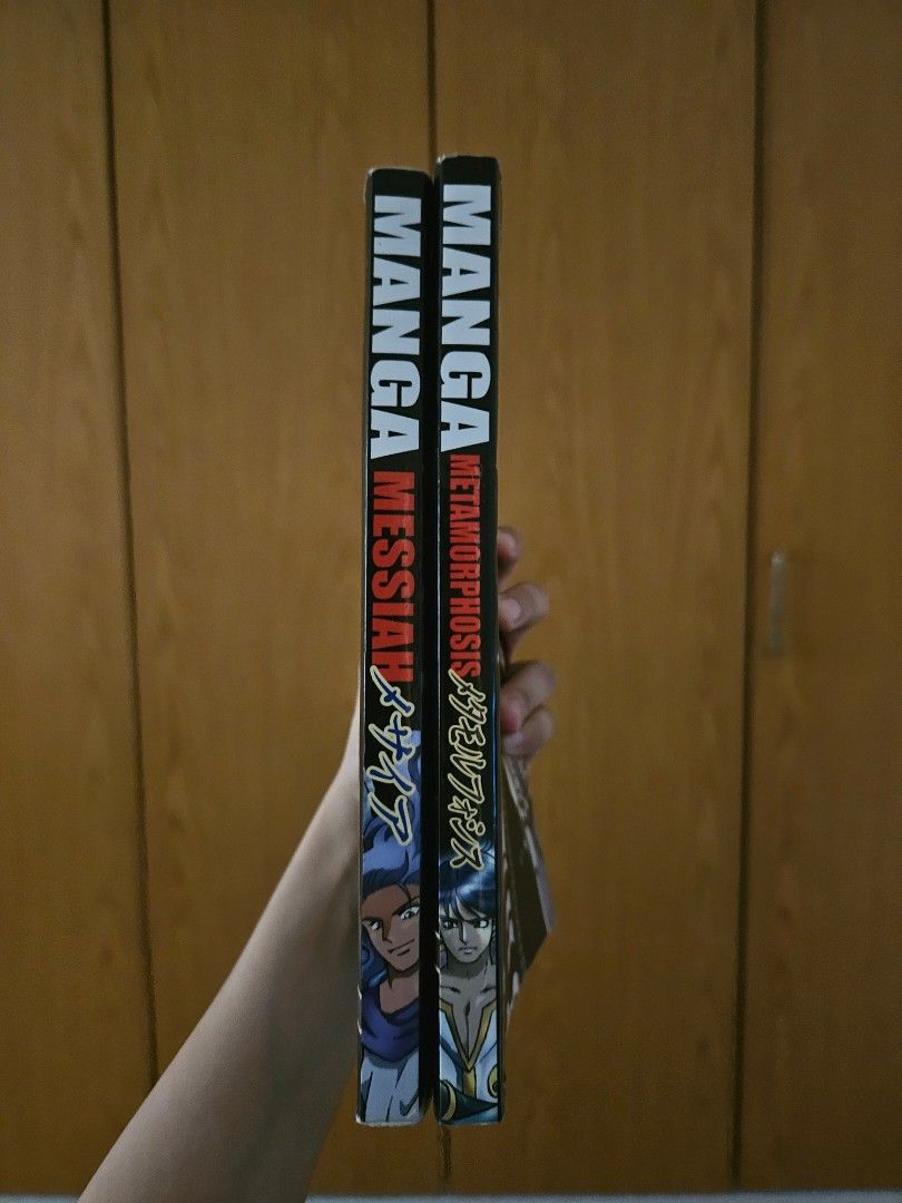 Manga Messiah & Metamorphosis Books (Category: Comics & Manga) located in Quezon City. Submitted by kimkimt (Listing ID 1463367411, Image 1). Description: - Two manga books for sale: Manga Messiah and Manga Metamorphosis. - Features Japanese text on the cover alongside English titles. - Ideal for manga collectors and fans. .