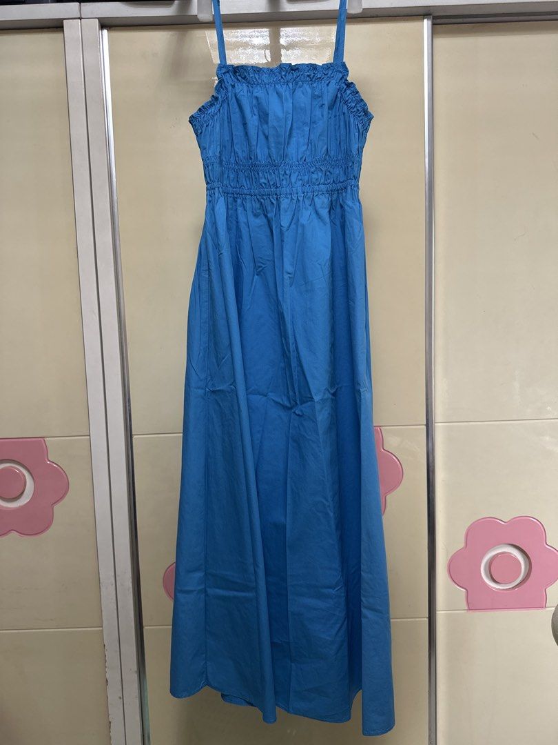 Mango Blue Smocked Maxi Dress (Category: Dresses) located in Manila. Submitted by joan.here (Listing ID 1463407667, Image 1). Description: Brand: mango Size: xs Condition: used but not abused. Actual color not as bright as shown in photo Mop: bank transfer Delivery: grab/ lalamove. Sf shouldered by buyer Loc: tondo manila.