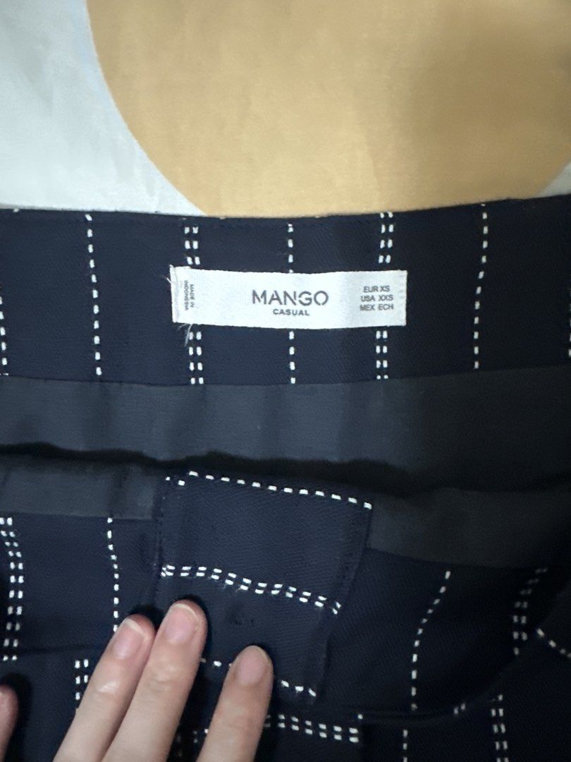 Mango Casual Striped Button-Front Mini Skirt (Category: Skirts) located in Manila. Submitted by joan.here (Listing ID 1463438463, Image 2). Description: Brand: mango Size: xs Condition: worn a few times Rfs: decluttering Mop: bank transfer Delivery: grab/ lalamove. Sf shouldered by buyer Loc: tondo manila.