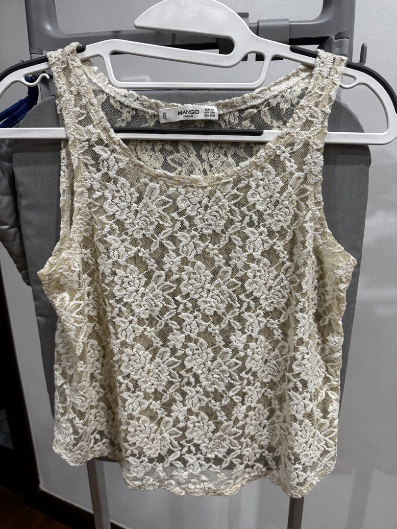 Mango Lace Tank Top Cream -XS (Category: Sleeveless) located in Manila. Submitted by goodthingspreloved.92 (Listing ID 1463392806, Image 2). Description: - stretchy (feels like a small) - Perfect for layering or wearing as a standalone piece - Easily dressed up or down for any occasion ; resort wear.