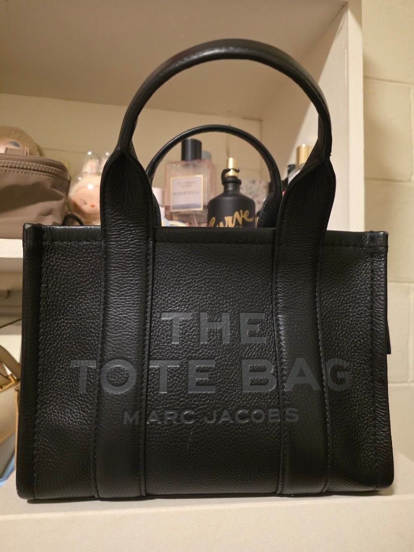 Marc Jacob Tote Bag (Category: Luxury Bags & Wallets) located in Manila. Submitted by carsel01 (Listing ID 1463459689, Image 1). Description: Bought for 14k from MJ outlet store. Guaranteed authentic! Used a few times only Lost long strap.