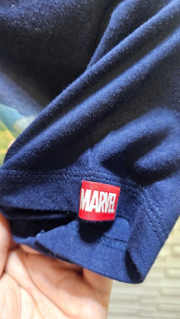 Marvel Avengers T-shirt Size 10 (Category: Tshirts & Polo Shirts ) located in Quezon City. Submitted by dawnest (Listing ID 1463505466, Image 2). Description: - Navy blue t-shirt - Cool Marvel Avengers graphic print featuring Iron Man, Captain America, Thor, and Hulk - Small Marvel tag on the sleeve - Size 10 - Ideal for any young Avengers fan! -16 inches width, 20 inches length .