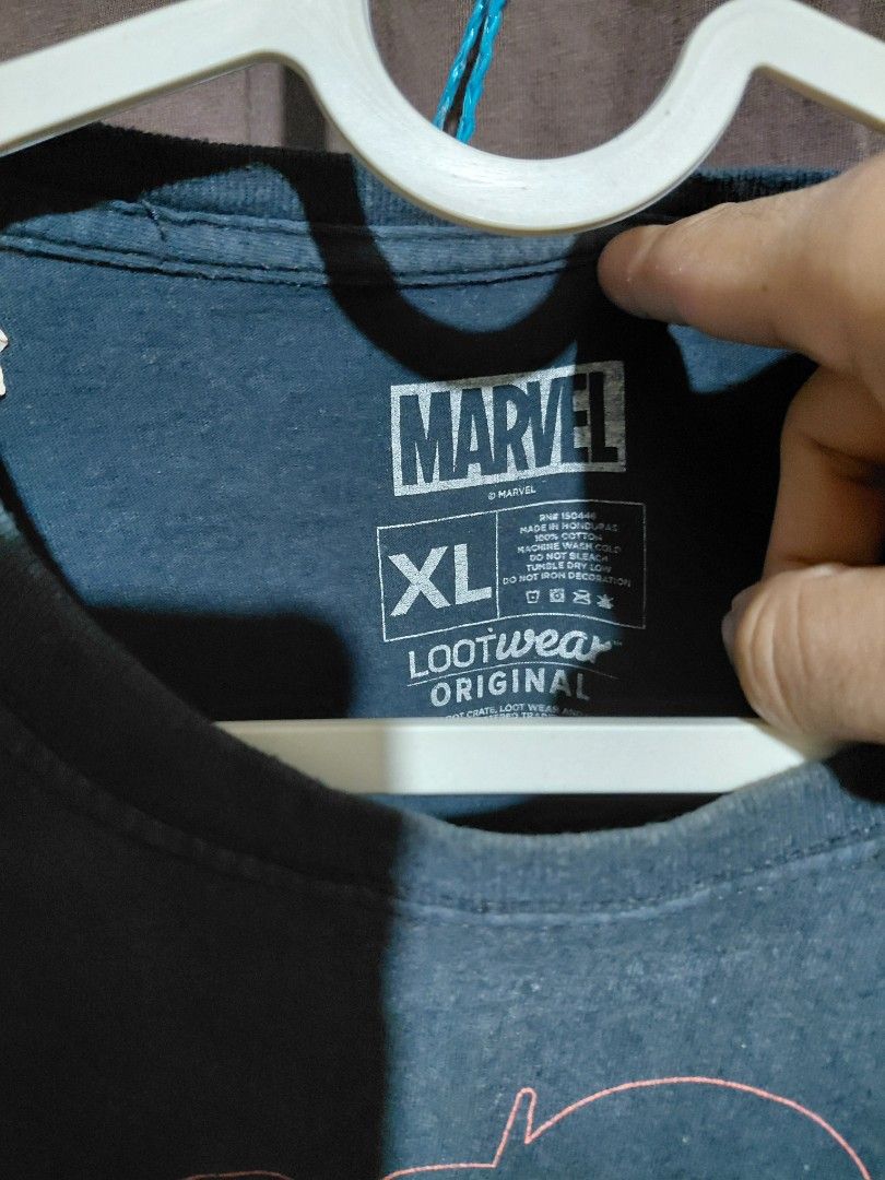 [MARVEL TEE] Marvel Ant Man XL Black Graphic T-Shirt (Category: Tshirts & Polo Shirts ) located in Imus. Submitted by frootiloots4103 (Listing ID 1463353321, Image 2). Description: - Lootwear Original Marvel graphic tee - Size: XL - Features a cool graphic design on the front - Ideal for any Marvel enthusiast! OPEN FOR NEGO (best if aspack) 📍Imus, Cavite 4103 Can do meetups within Imus Area 🚚 J&T or Lalamove 📨 DMs are OPEN 💸 Cash | GCash | BD